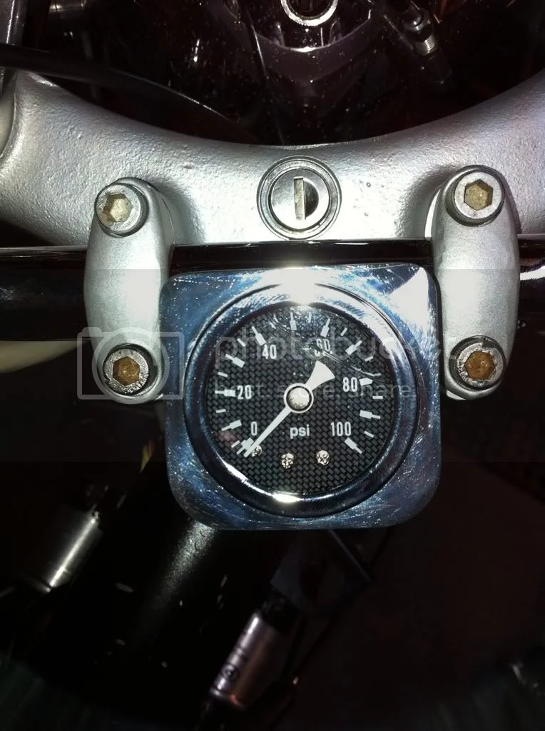 Oil pressure gauge mounting.