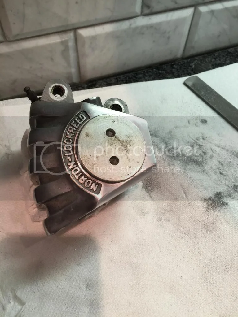 Need advice on cleaning up a caliper.