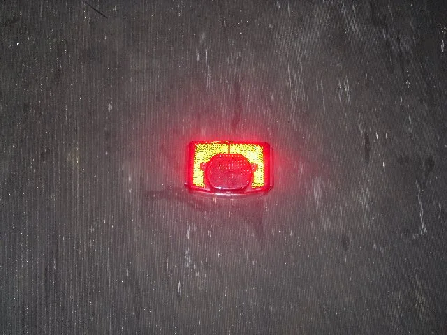 Rear lamp lens...has no reflector??