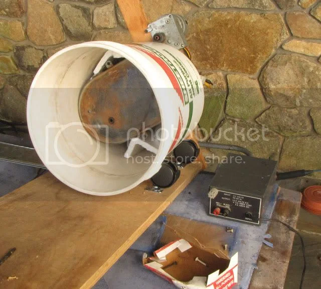 Spackle bucket rube goldberg tank cleaner