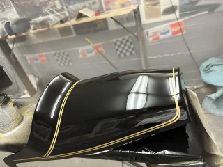 Fastback tank paint and bodywork done.