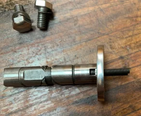 Rocker spindle misaligned.