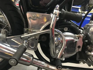 Non standard footpegs, gear change, rear brake lever